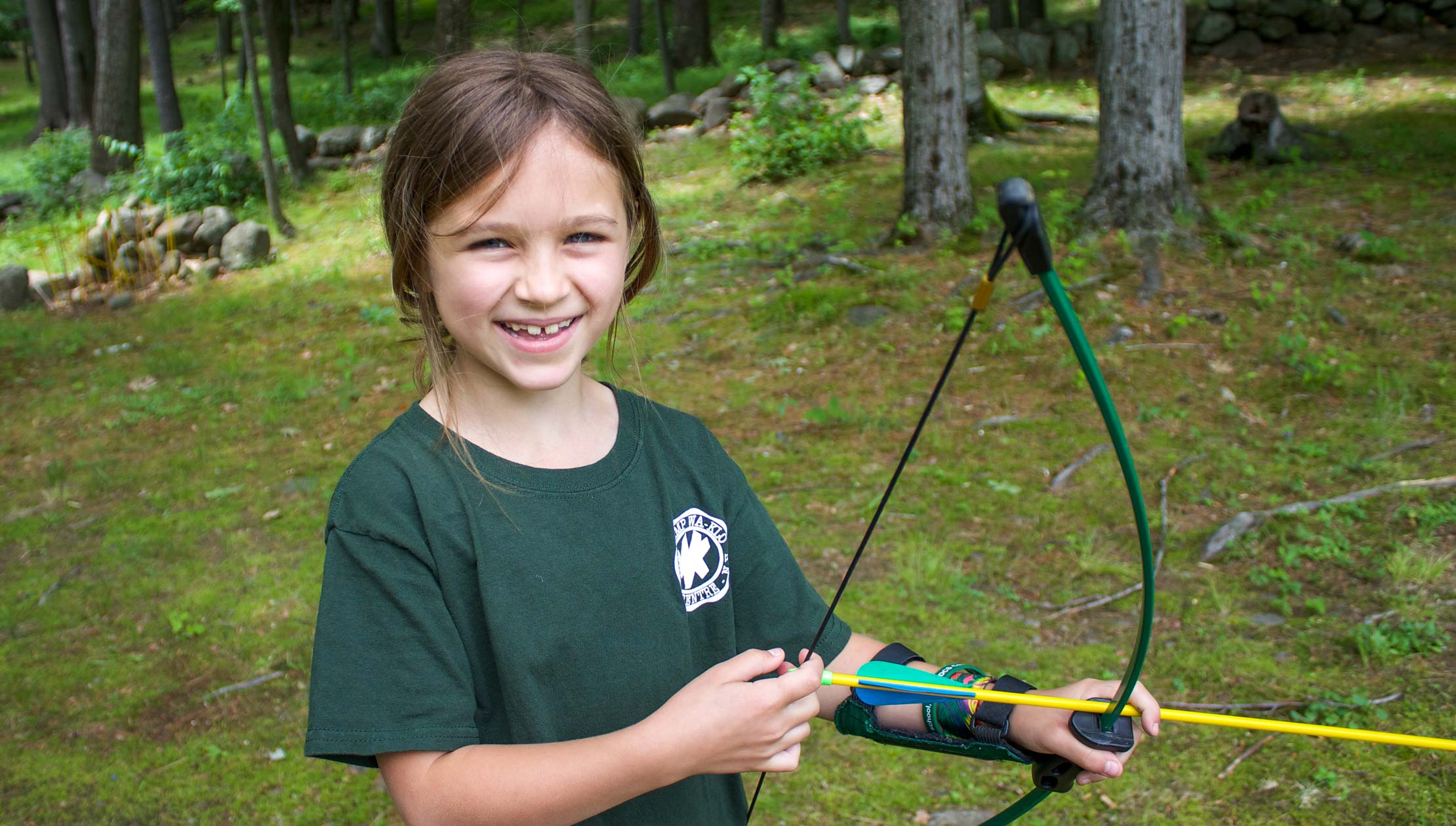 Young camper at archery