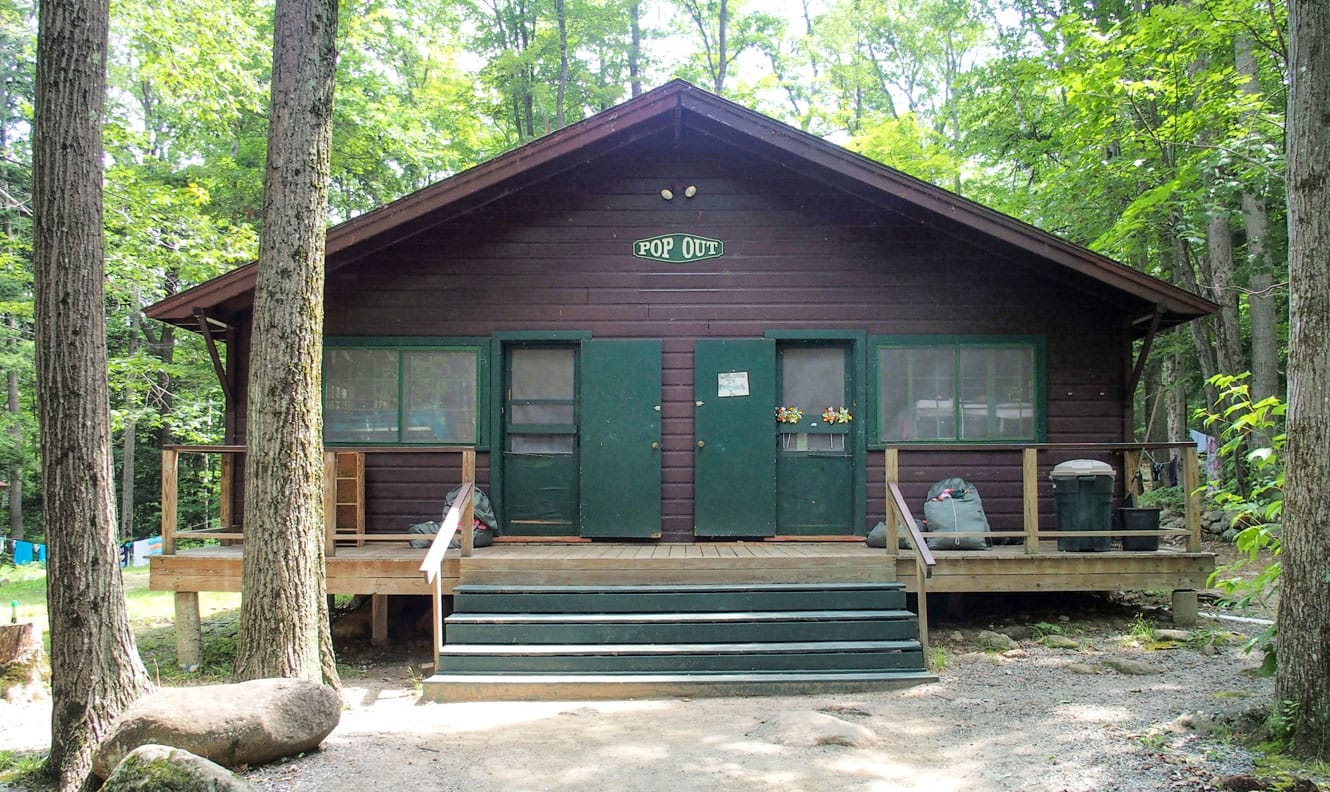 Girl's cabin nestled in the woods