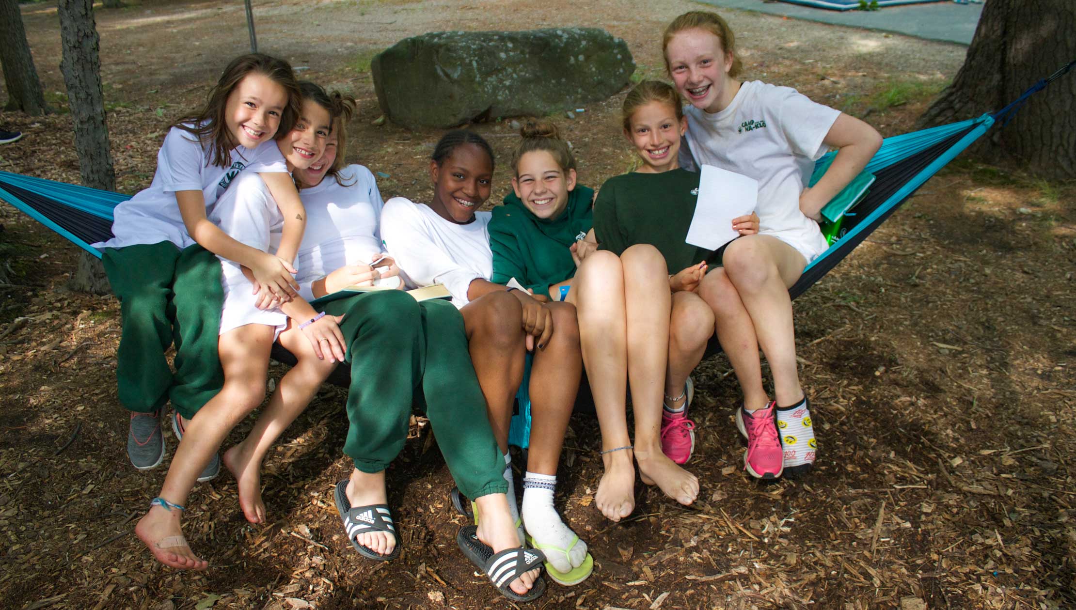 Group of girls in hammock reading