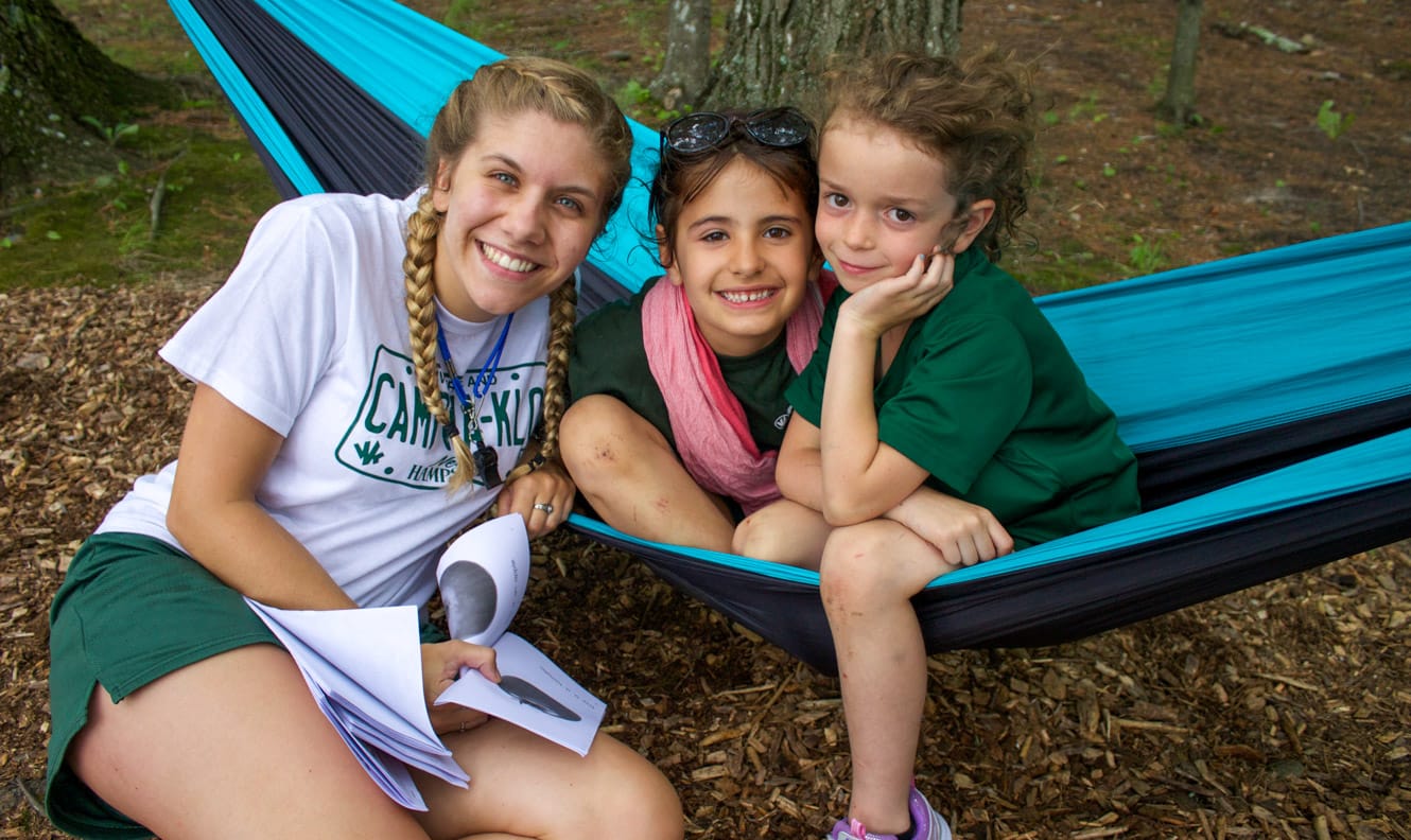 Campers on hammock with staff