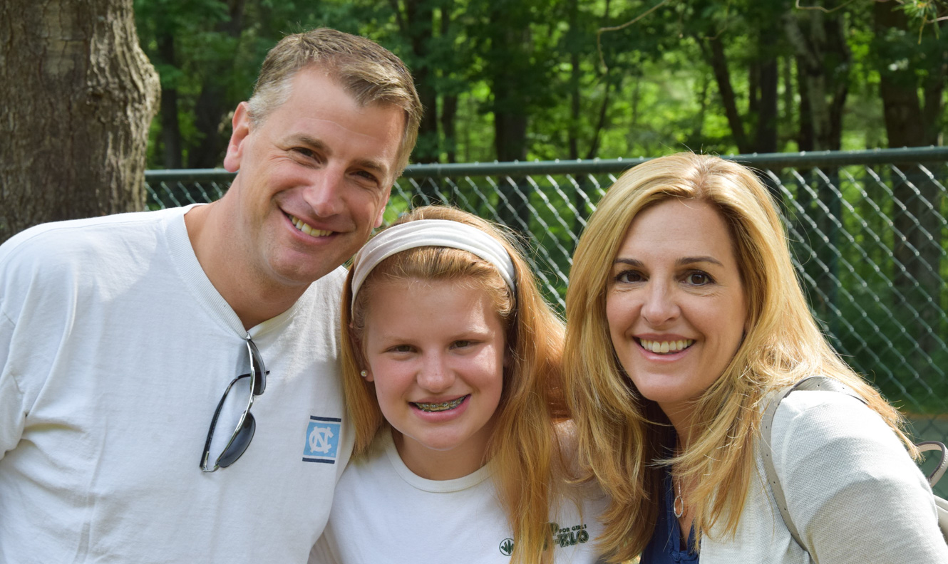 Parents and daughter at Family Camp