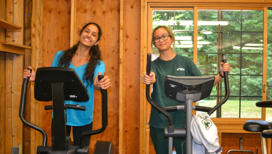 Campers on exercise machines