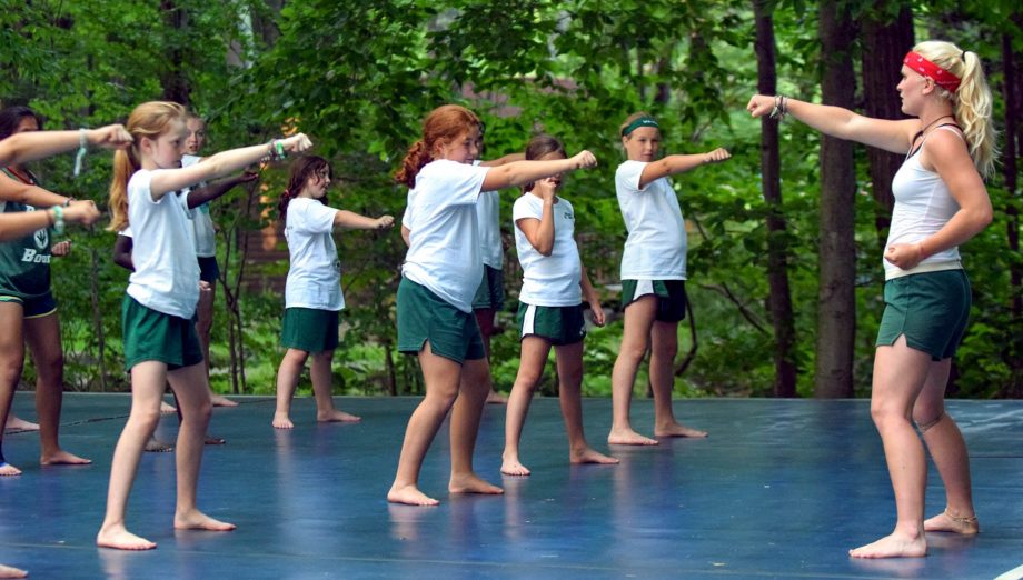 Campers and instructor at pilates