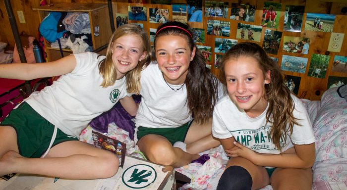 Three girls in their bunk