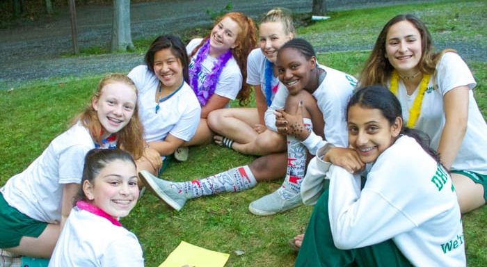 Group of girls relaxing on lawn