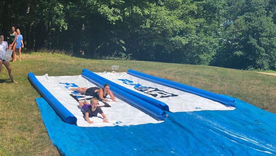 Campers going on slip-n-slide