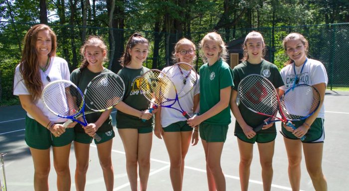 Girls playing tennis